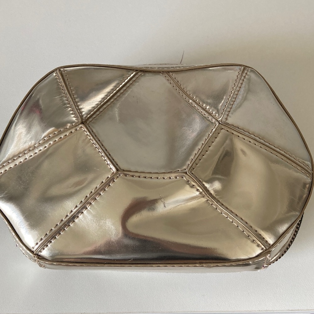 POVERTY FLATS by rian Geometric Pale Gold Clutch